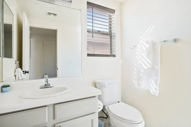 sunlit villa bathroom half